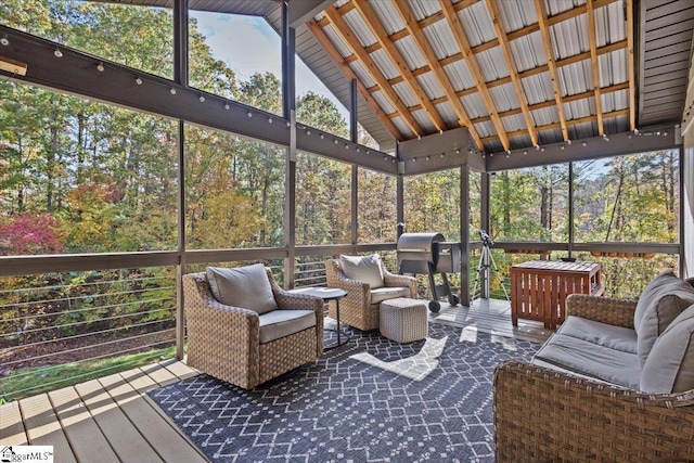 sunroom / solarium with vaulted ceiling