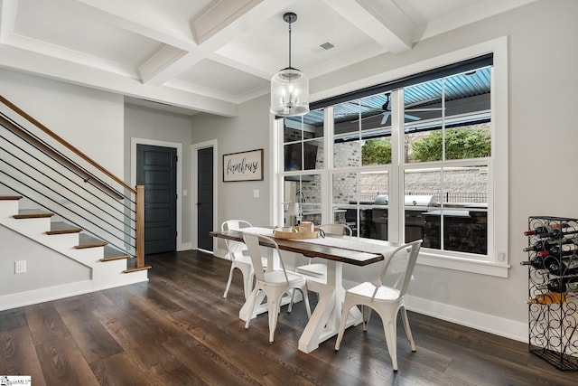 dining space featuring visible vents, baseboards, dark wood-type flooring, and beam ceiling