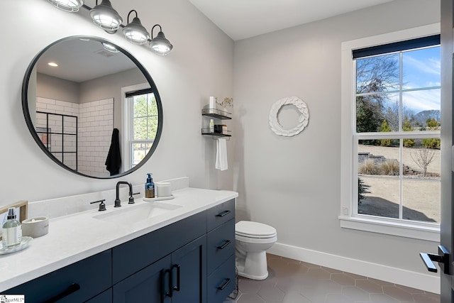 full bath with visible vents, baseboards, toilet, and vanity