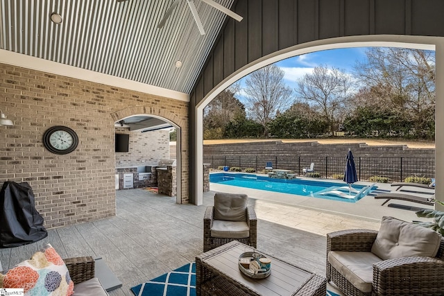 view of patio / terrace with a fenced in pool and a fenced backyard