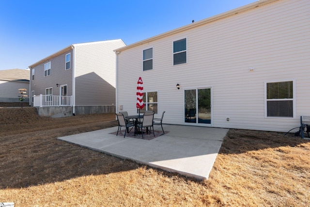 back of house featuring a patio