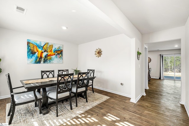 dining area with recessed lighting, visible vents, baseboards, and wood finished floors