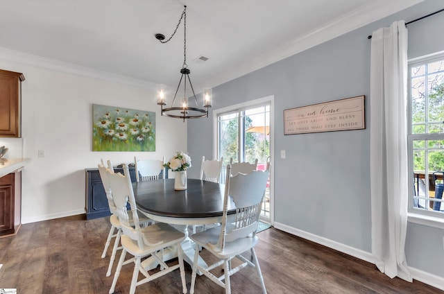 dining room featuring dark wood finished floors, baseboards, visible vents, and a wealth of natural light