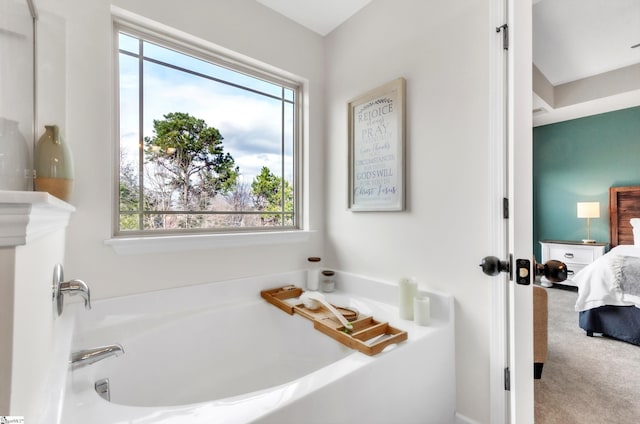 full bathroom with ensuite bathroom and a garden tub