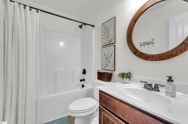 full bath featuring vanity, toilet, and shower / bath combo