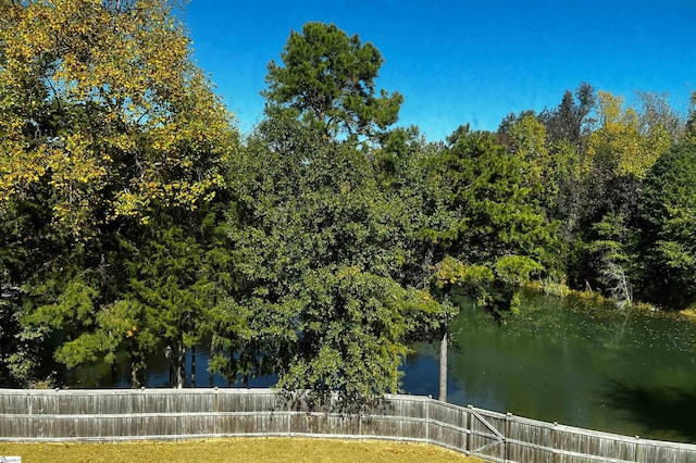 water view featuring fence