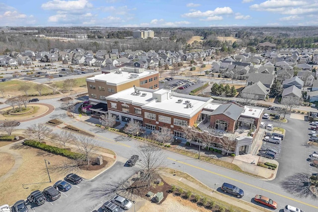 birds eye view of property with a residential view