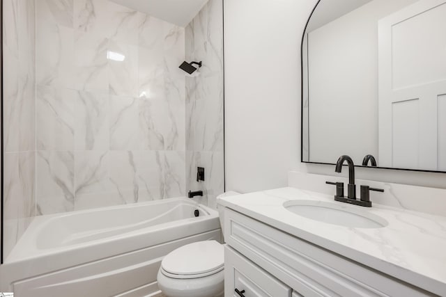 bathroom featuring vanity, toilet, and shower / washtub combination