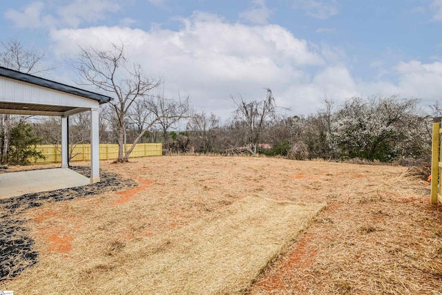 view of yard featuring fence