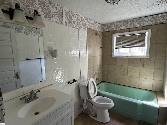 full bathroom featuring wallpapered walls, shower / tub combination, a textured ceiling, tile walls, and toilet