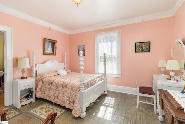 bedroom with baseboards and ornamental molding