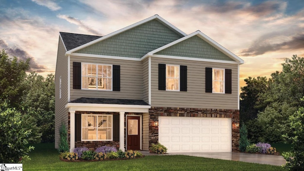 craftsman-style house featuring concrete driveway, an attached garage, and stone siding