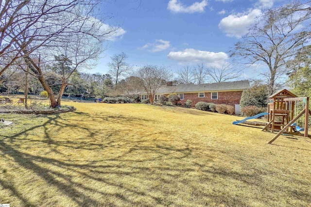 view of yard featuring a playground