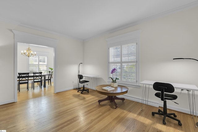 misc room featuring a baseboard heating unit, a notable chandelier, light wood-type flooring, and ornamental molding