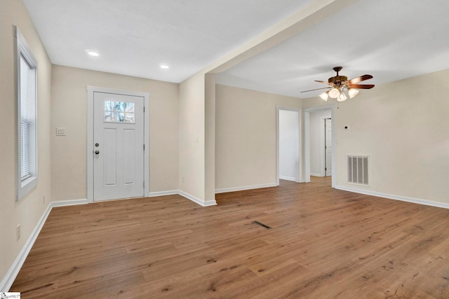 entrance foyer featuring visible vents, a ceiling fan, recessed lighting, light wood-style floors, and baseboards