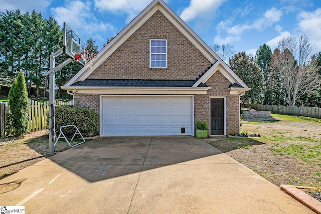 traditional home with brick siding, a shingled roof, and fence