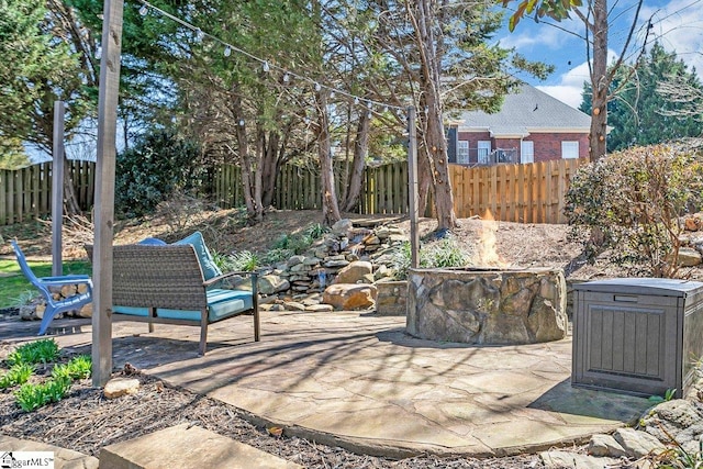 view of patio featuring fence