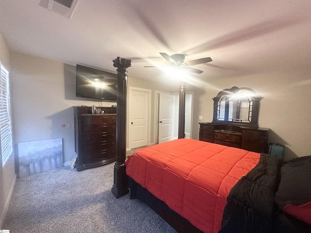 carpeted bedroom with a ceiling fan, visible vents, and baseboards