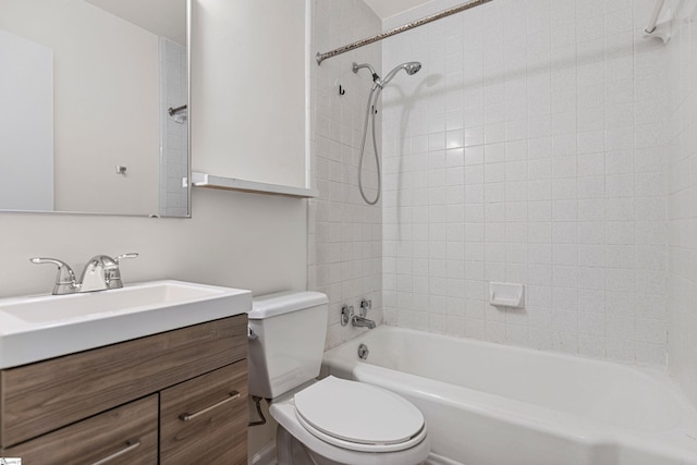 bathroom with toilet, vanity, and bathtub / shower combination