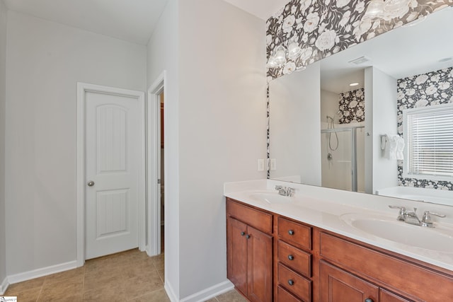 full bathroom featuring double vanity, a stall shower, a garden tub, and a sink