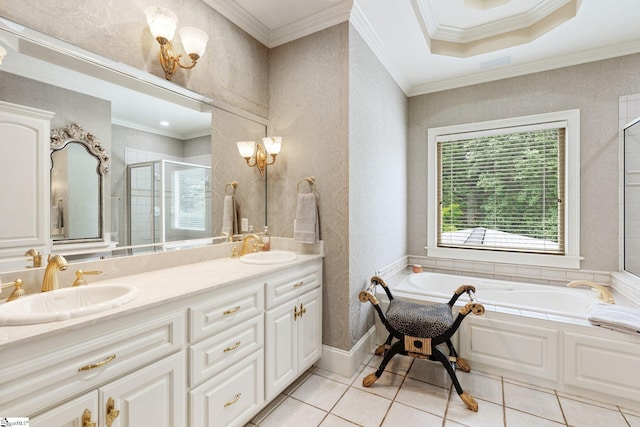 full bathroom featuring a shower stall, ornamental molding, a bath, and a sink