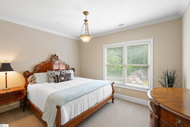 bedroom with visible vents, light colored carpet, baseboards, and ornamental molding