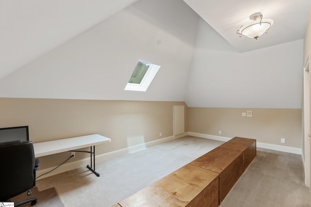 bonus room featuring carpet flooring, vaulted ceiling with skylight, and baseboards