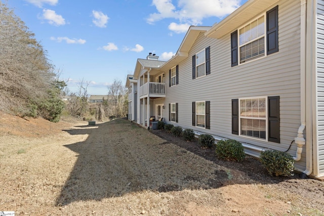 view of property exterior featuring a balcony