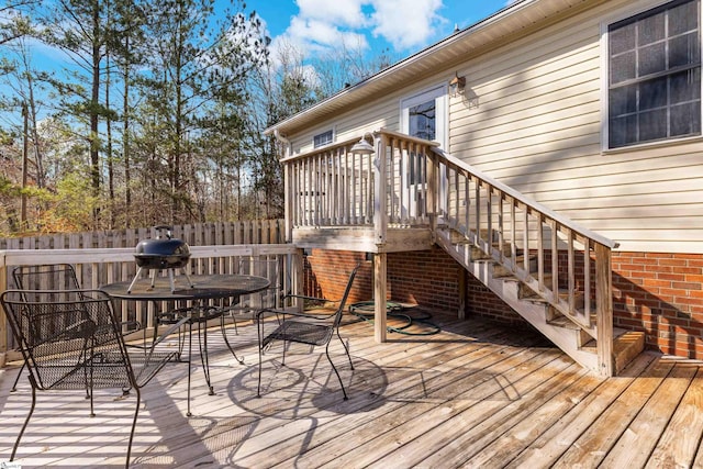 wooden deck with stairs and fence