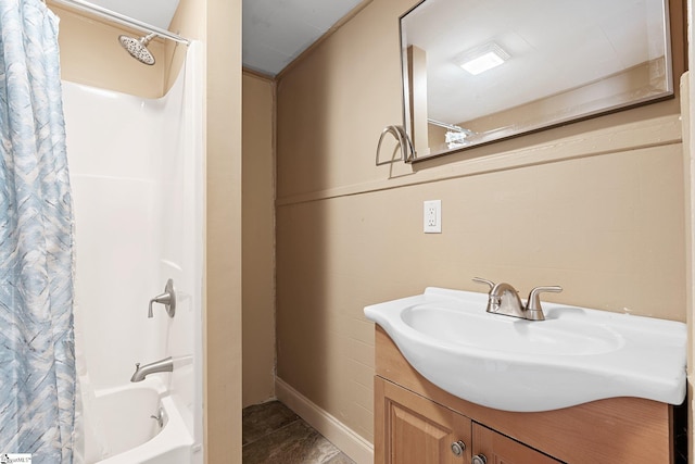 full bathroom featuring vanity and shower / bathtub combination with curtain