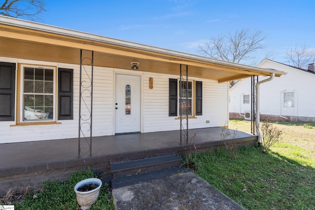 property entrance with a porch