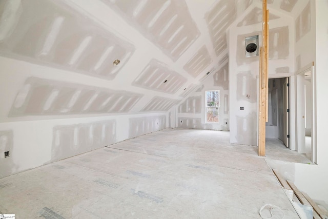 bonus room with vaulted ceiling