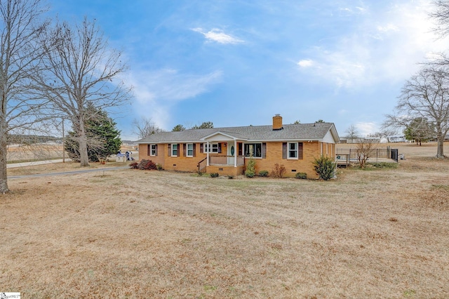 single story home featuring crawl space, a chimney, brick siding, and a shingled roof