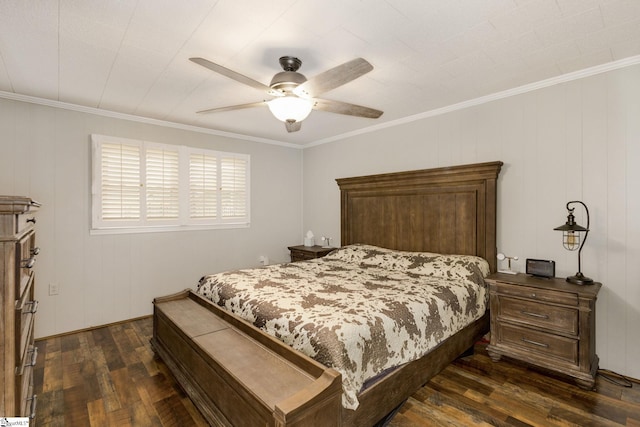 bedroom featuring dark wood-type flooring, a ceiling fan, and ornamental molding