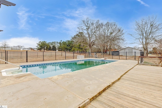 view of pool with a fenced in pool, a patio, and a fenced backyard