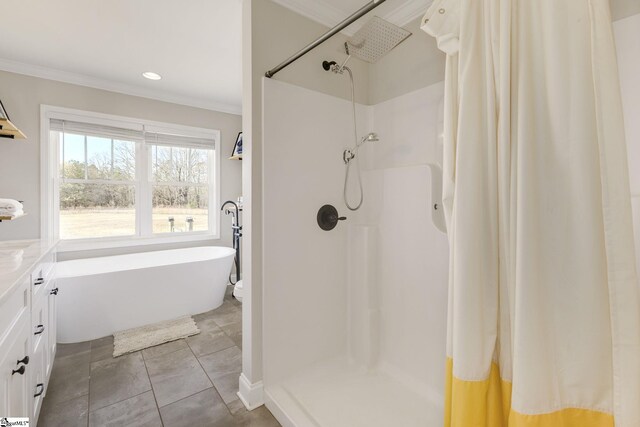 bathroom with a shower with shower curtain, crown molding, a freestanding tub, and recessed lighting