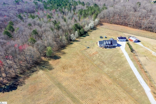 aerial view featuring a forest view