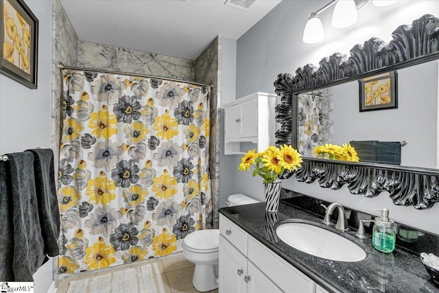 bathroom with visible vents, toilet, curtained shower, tile patterned flooring, and vanity