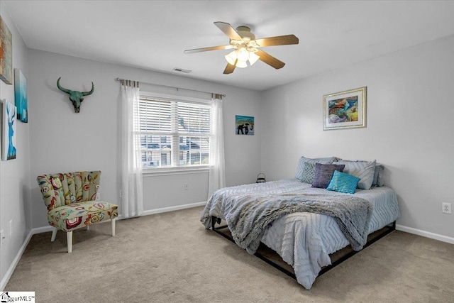 bedroom featuring visible vents, ceiling fan, baseboards, and carpet floors