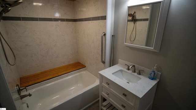 full bath featuring vanity and shower / bathtub combination