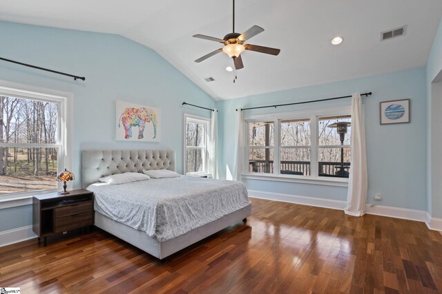 bedroom with visible vents, baseboards, dark wood finished floors, lofted ceiling, and a ceiling fan