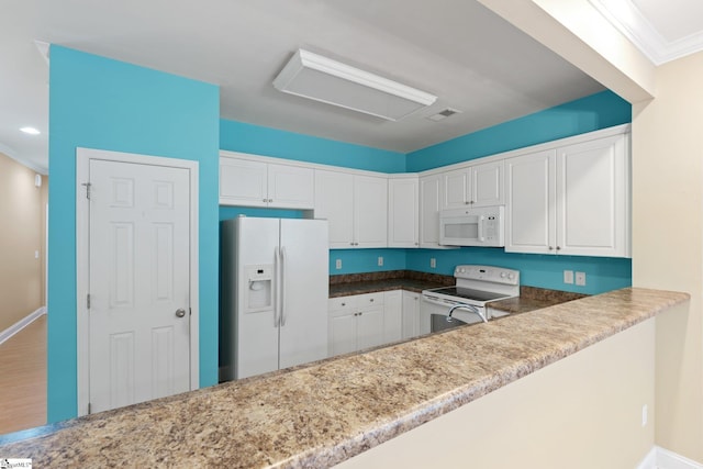 kitchen featuring light stone counters, white appliances, white cabinetry, and ornamental molding