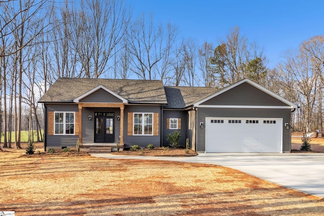 view of front facade with crawl space, driveway, a shingled roof, and a garage