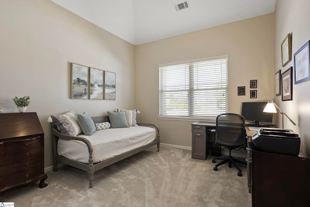 office area featuring visible vents, light colored carpet, and baseboards