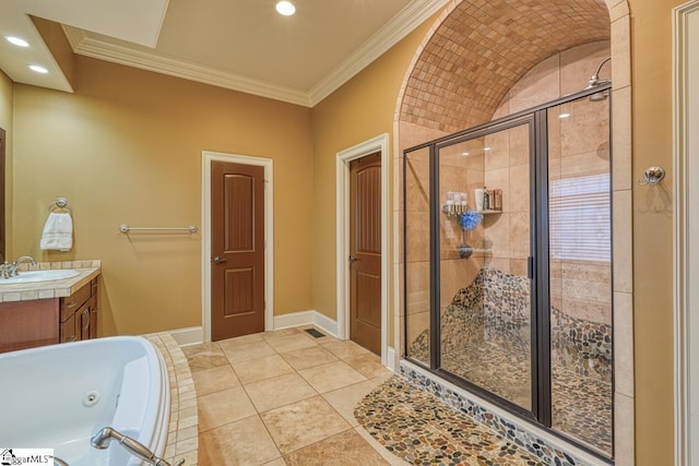 full bathroom with baseboards, a jetted tub, a stall shower, and crown molding