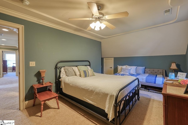 bedroom featuring visible vents, crown molding, ceiling fan, lofted ceiling, and light carpet