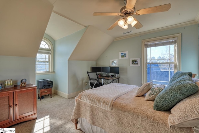 bedroom featuring baseboards, visible vents, lofted ceiling, ceiling fan, and carpet flooring