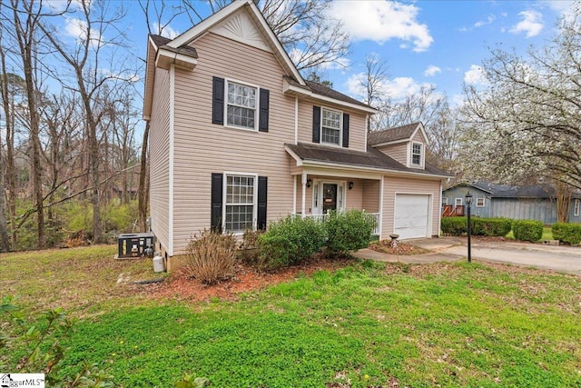 traditional home featuring a garage, central AC unit, driveway, and a front yard