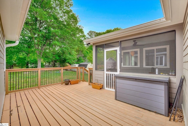 deck with a sunroom