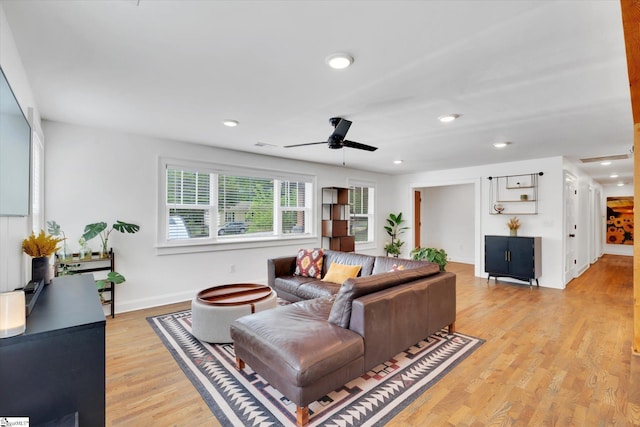 living room with recessed lighting, baseboards, light wood-type flooring, and a ceiling fan